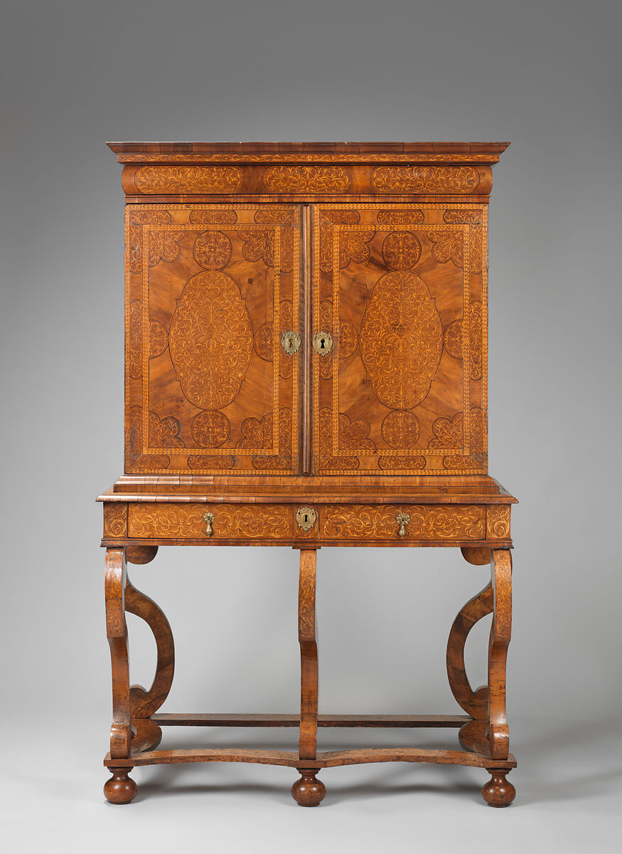 Cabinet on stand, Pine veneered with marquetry of walnut, burl; walnut and holly; oak drawers; brass hardware, British 