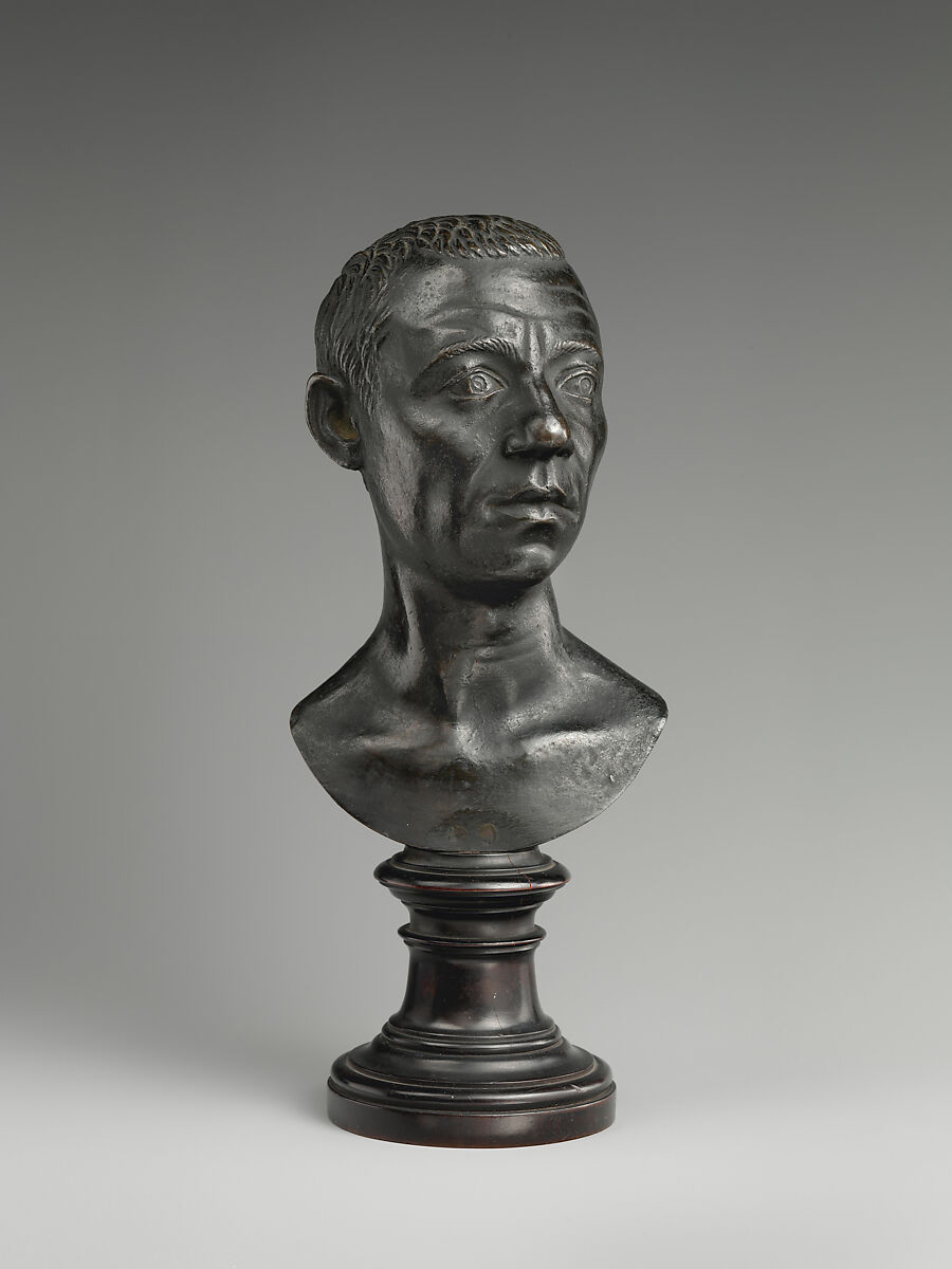Bust of a Roman, Bronze, on a later wood socle, Northern Italian 