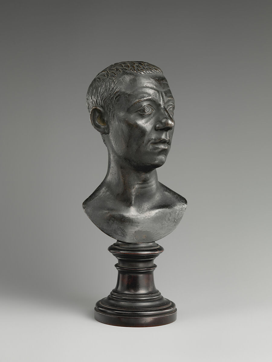 Bust of a Roman, Bronze, on a later wood socle, Northern Italian