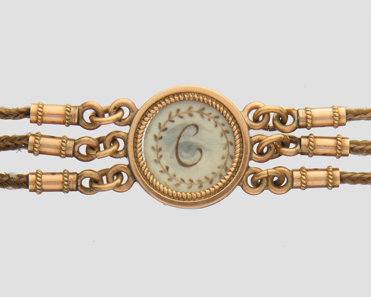 Lover’s Eye Watch Fob, 4 watercolor on ivory lover’s eyes set in gold cases and attached to a gold and hairwork chain, Probably British