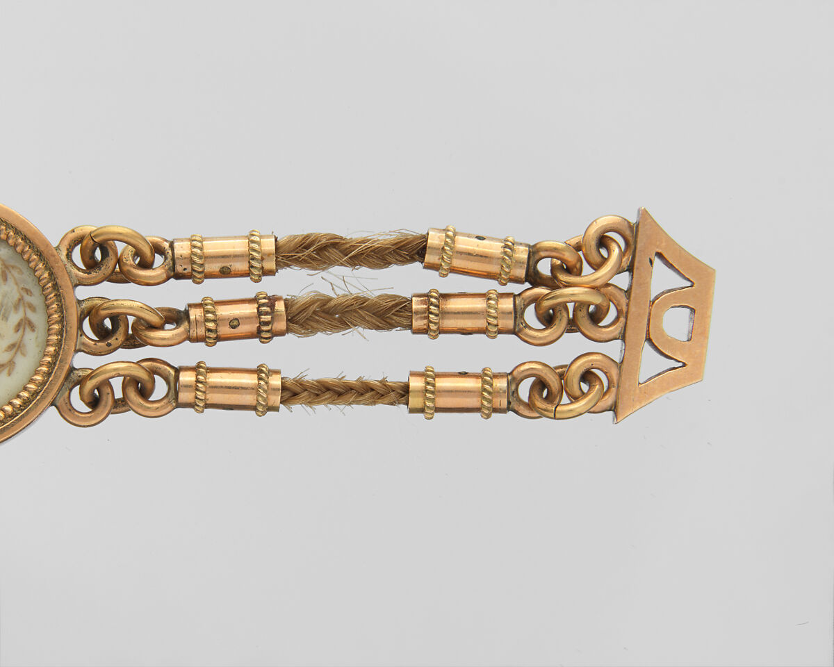 Lover’s Eye Watch Fob, 4 watercolor on ivory lover’s eyes set in gold cases and attached to a gold and hairwork chain, Probably British