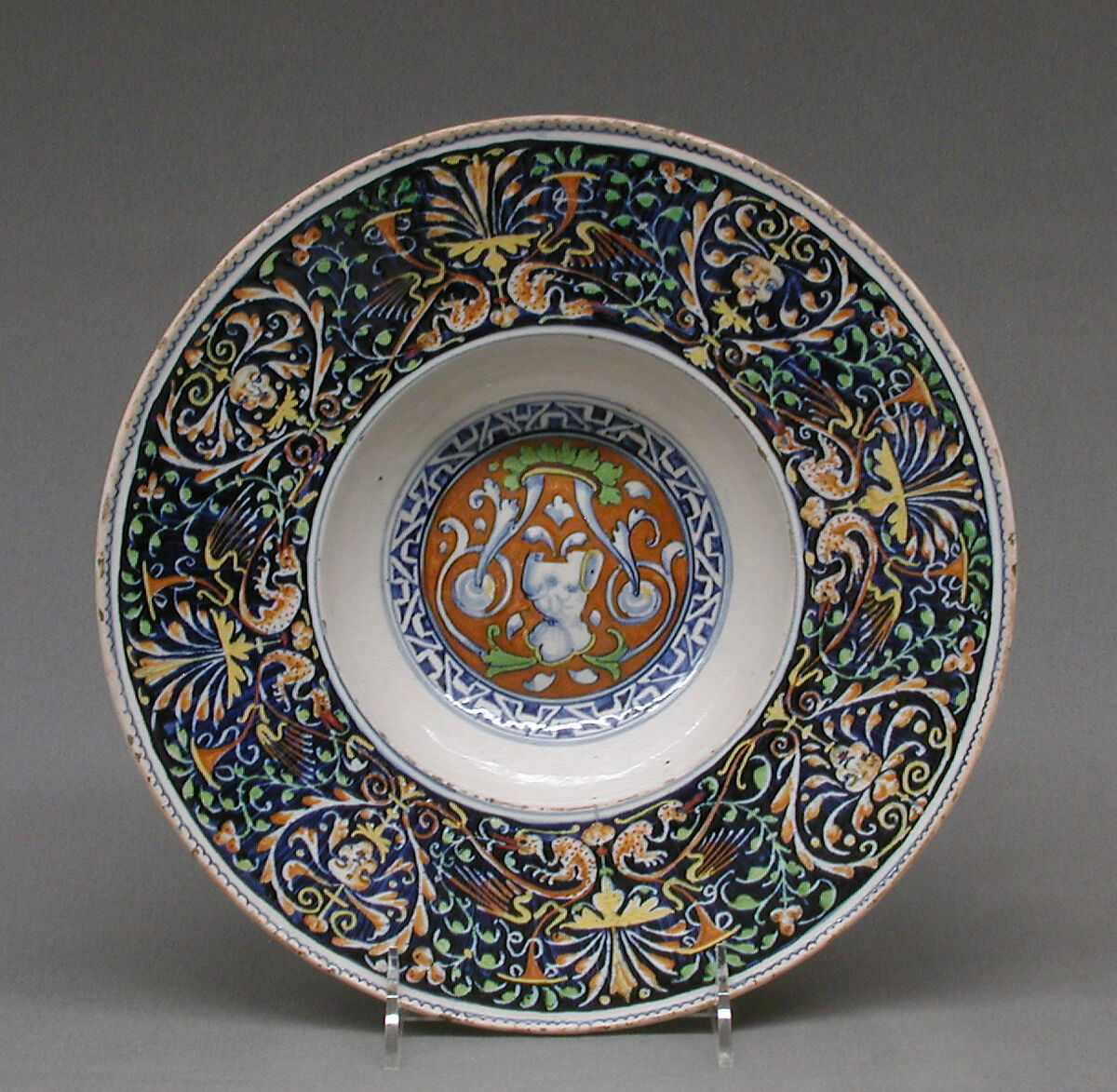 Plate, The Vulcan painter, Maiolica (tin-glazed earthenware), Italian, Caffaggiolo 
