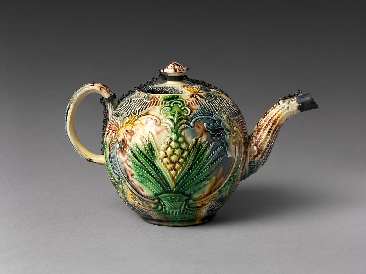 Teapot with relief decoration, Style of Whieldon type, Earthenware with molded decoration painted with metal oxides under transparent glaze, probably British, Staffordshire