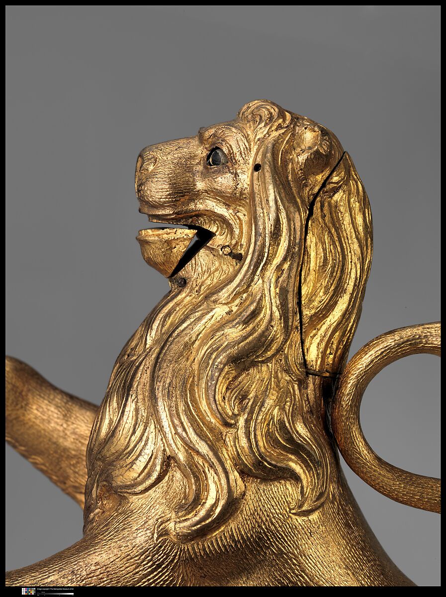 Automaton clock in the form of a lion, Clockmaker: Karl Schmidt (German, ca. 1590–1635/36, working 1614), Case: gilded brass and gilded silver on a base of ebony, and ebony veneered on fruitwood; Dial: silvered brass; Movement: iron and brass, German, Augsburg