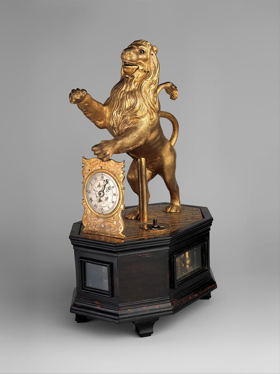Automaton clock in the form of a lion, Clockmaker: Karl Schmidt (German, ca. 1590–1635/36, working 1614), Case: gilded brass and gilded silver on a base of ebony, and ebony veneered on fruitwood; Dial: silvered brass; Movement: iron and brass, German, Augsburg 