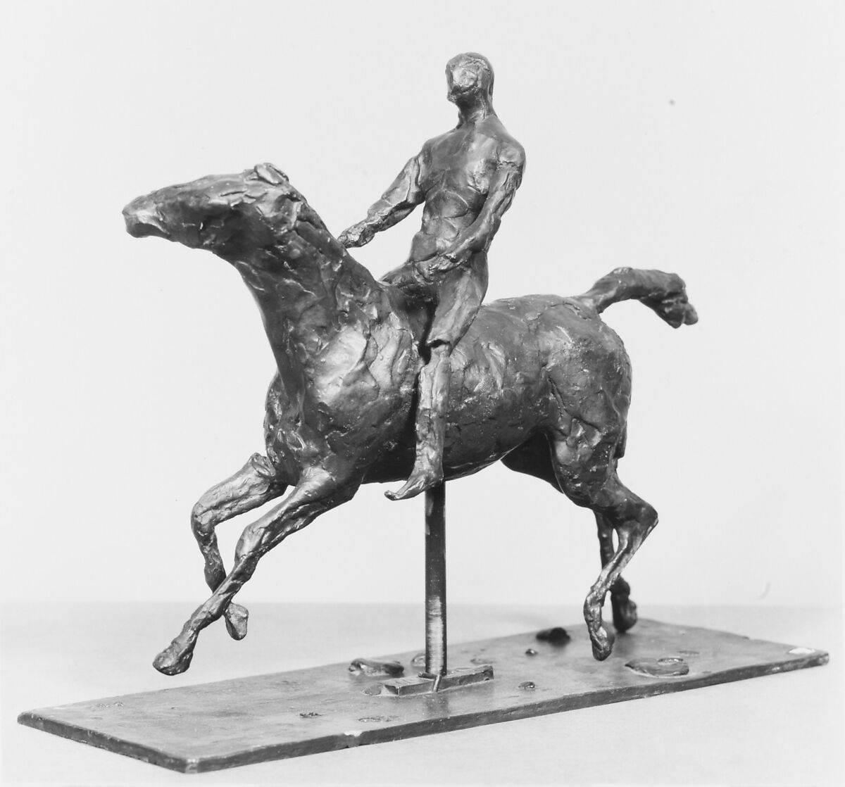Horse with Jockey; Horse Galloping, Turning the Head to the Right, the Feet Not Touching the Ground, Edgar Degas (French, Paris 1834–1917 Paris), Bronze, French 