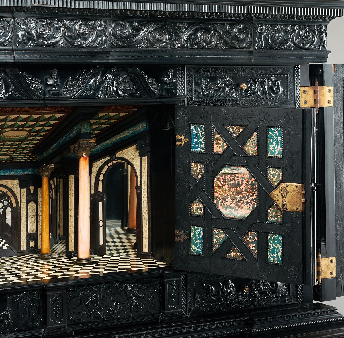 Cabinet, Oak and poplar wood veneered with ebony; ivory; stained ivory; bone, and various marquetry woods, including kingwood and amaranth; ebonized pearwood; gilt-bronze capitals and bases; plated-iron hardware, French, Paris