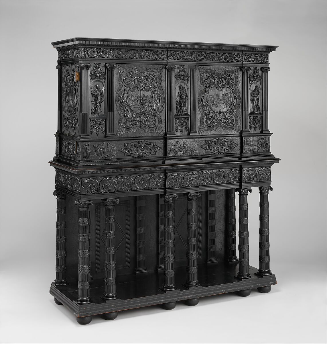 Cabinet, Oak and poplar wood veneered with ebony; ivory; stained ivory; bone, and various marquetry woods, including kingwood and amaranth; ebonized pearwood; gilt-bronze capitals and bases; plated-iron hardware, French, Paris
