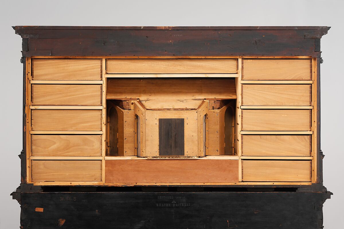 Cabinet, Oak and poplar wood veneered with ebony; ivory; stained ivory; bone, and various marquetry woods, including kingwood and amaranth; ebonized pearwood; gilt-bronze capitals and bases; plated-iron hardware, French, Paris