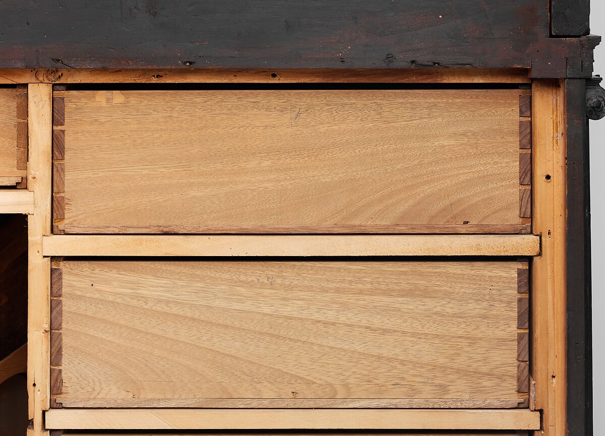 Cabinet, Oak and poplar wood veneered with ebony; ivory; stained ivory; bone, and various marquetry woods, including kingwood and amaranth; ebonized pearwood; gilt-bronze capitals and bases; plated-iron hardware, French, Paris