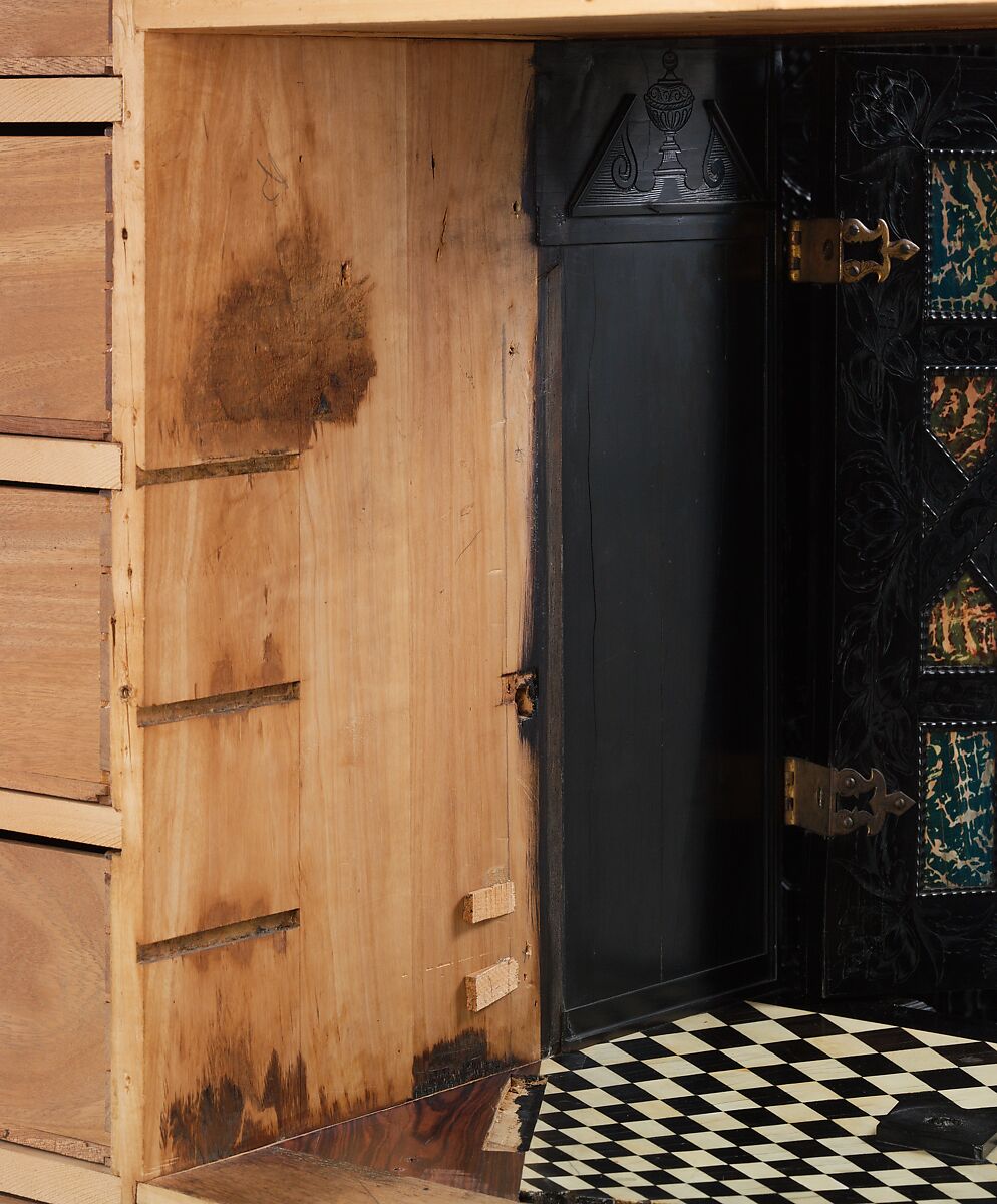 Cabinet, Oak and poplar wood veneered with ebony; ivory; stained ivory; bone, and various marquetry woods, including kingwood and amaranth; ebonized pearwood; gilt-bronze capitals and bases; plated-iron hardware, French, Paris