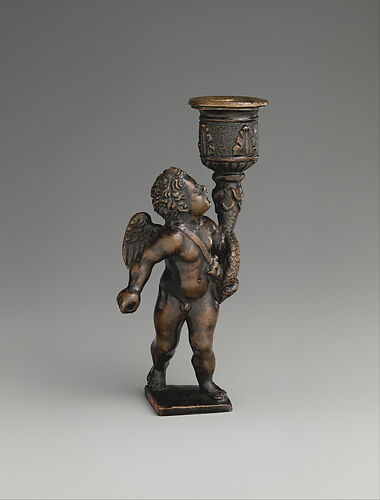 Cupid bearing a quiver and a candle socket