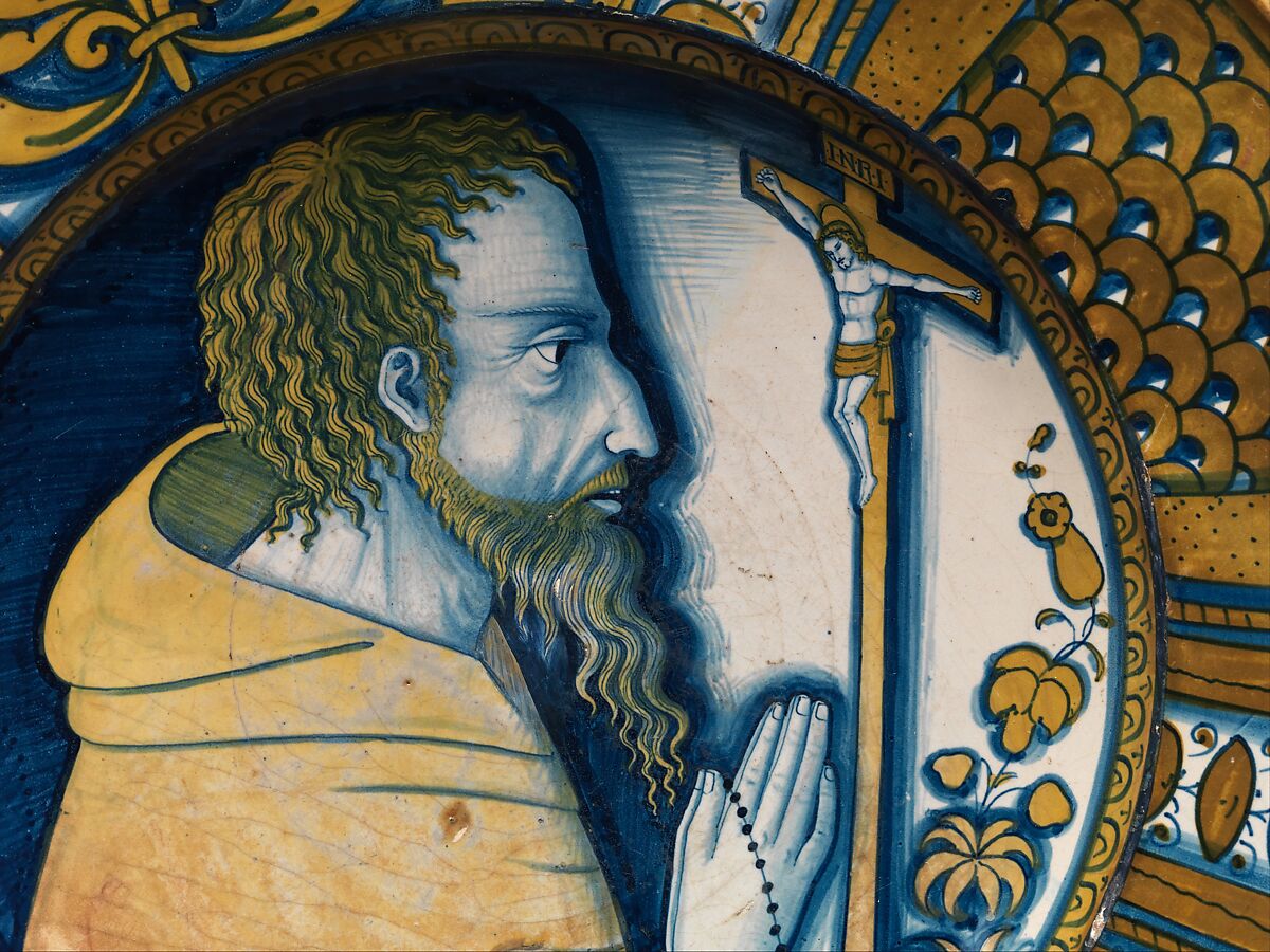 Dish with saint (Saint Francis?) or friar praying before crucifix, Maiolica (tin-glazed earthenware), lustered, Italian, Deruta