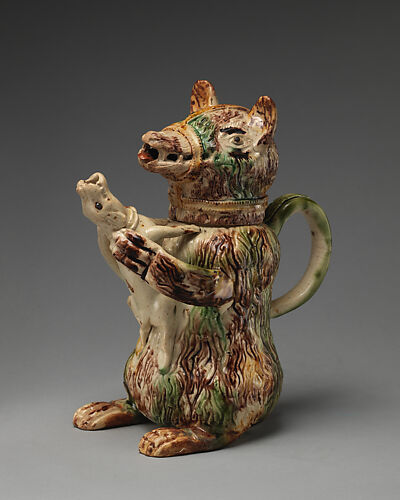 Jug in the form of a bear hugging a small dog