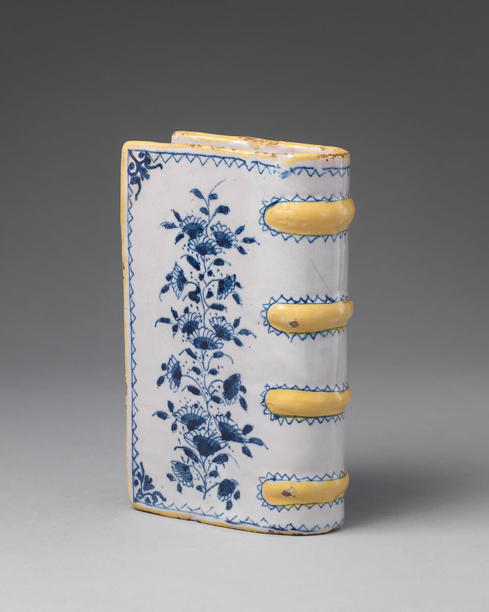 Hand warmer or flask in the shape of a book, Tin-glazed earthenware, British, Lambeth