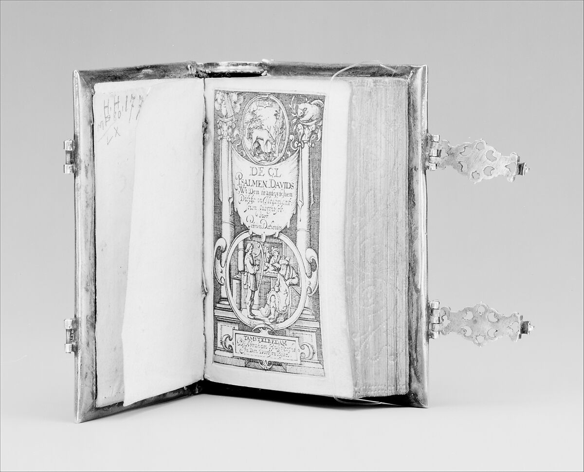 Book cover, Silver, lined with black velvet, containing a contemporary psalter, Dutch, possibly Amsterdam