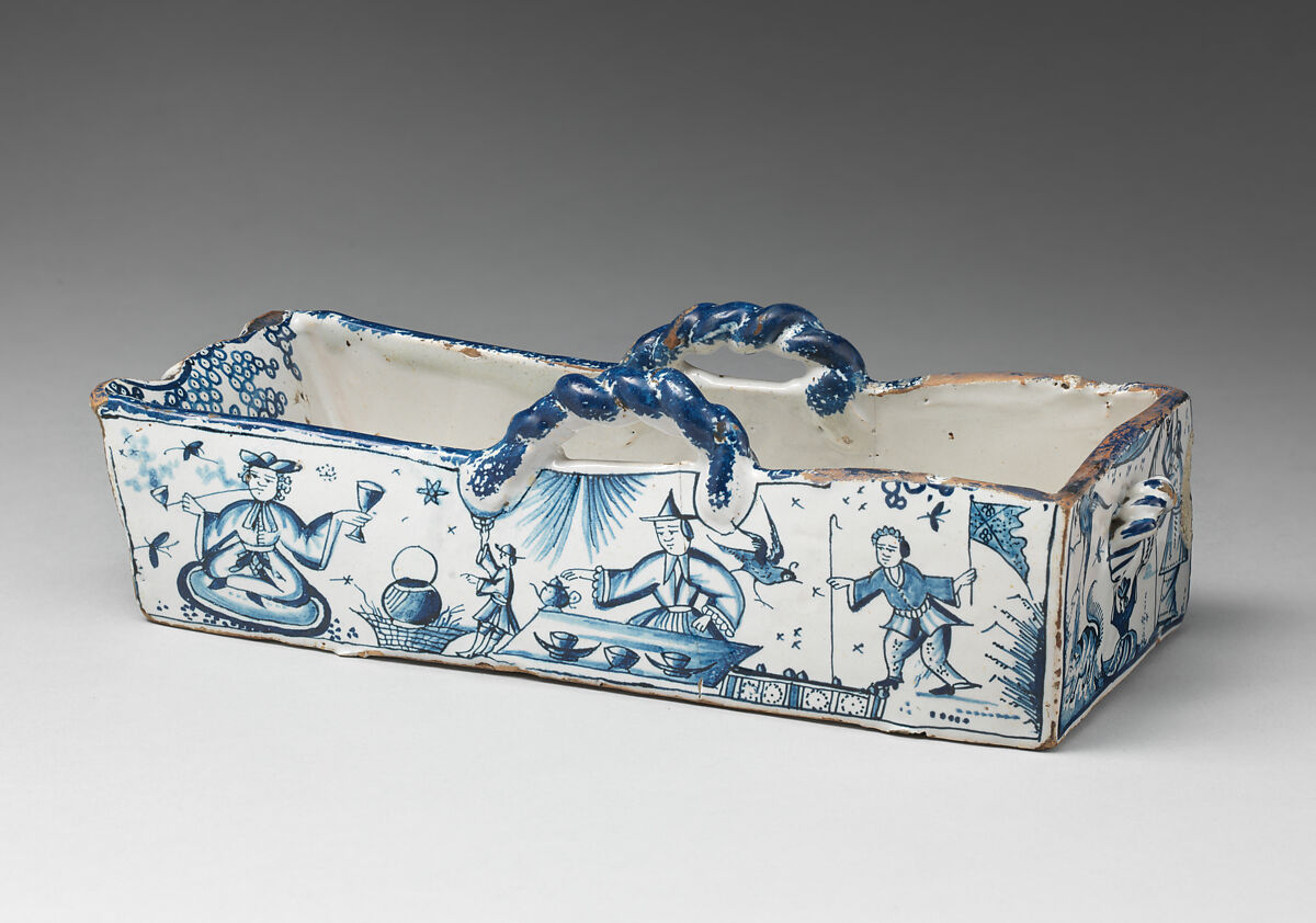 Model of a cradle, Tin-glazed earthenware, British