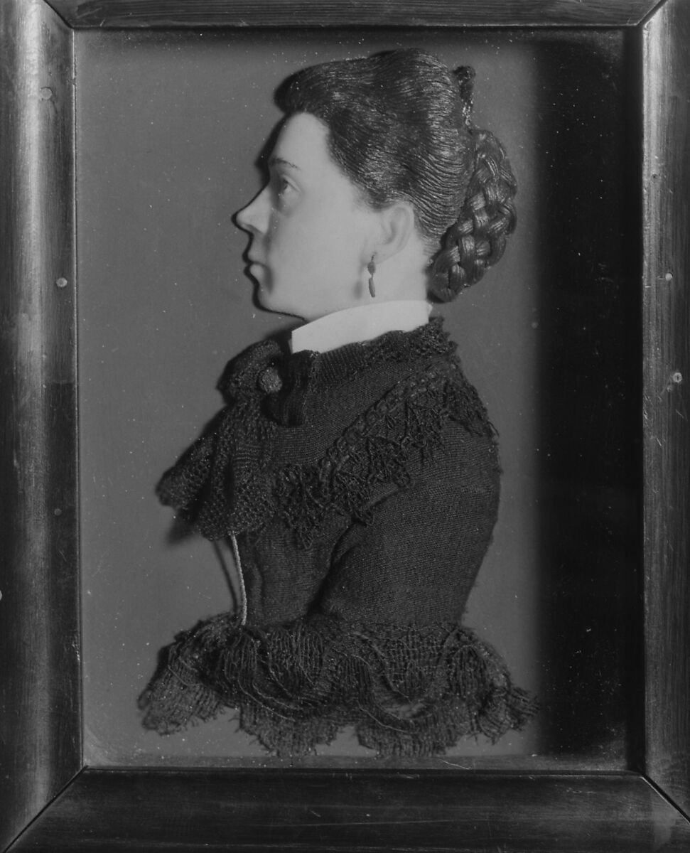 Portrait of a woman, Relief: colored wax with dress of applied black cloth and lace; background: slate (?), painted reddish brown; frame: wood, probably French 