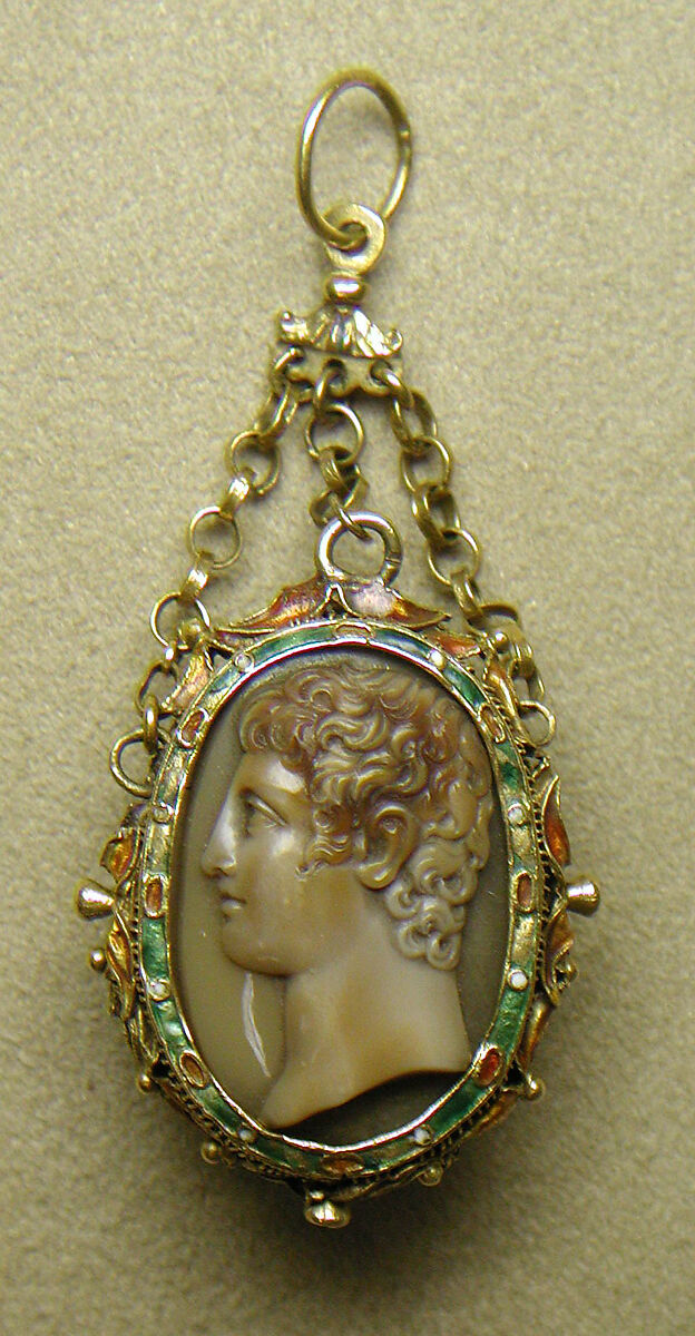 Head of a youth and Agnus Dei with arms of Paul V (Camillo Borghese, Pope 1605–21), Agate, mounted in gold with enamel as a pendant; papier-mâché, Italian 