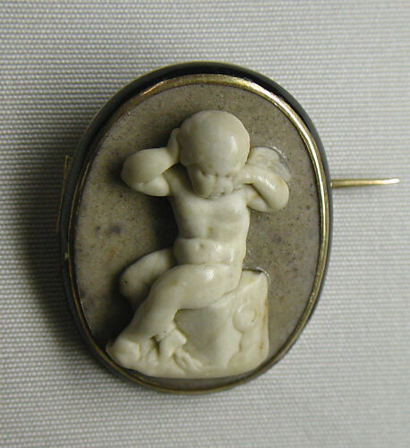 Cupid chained to a rock