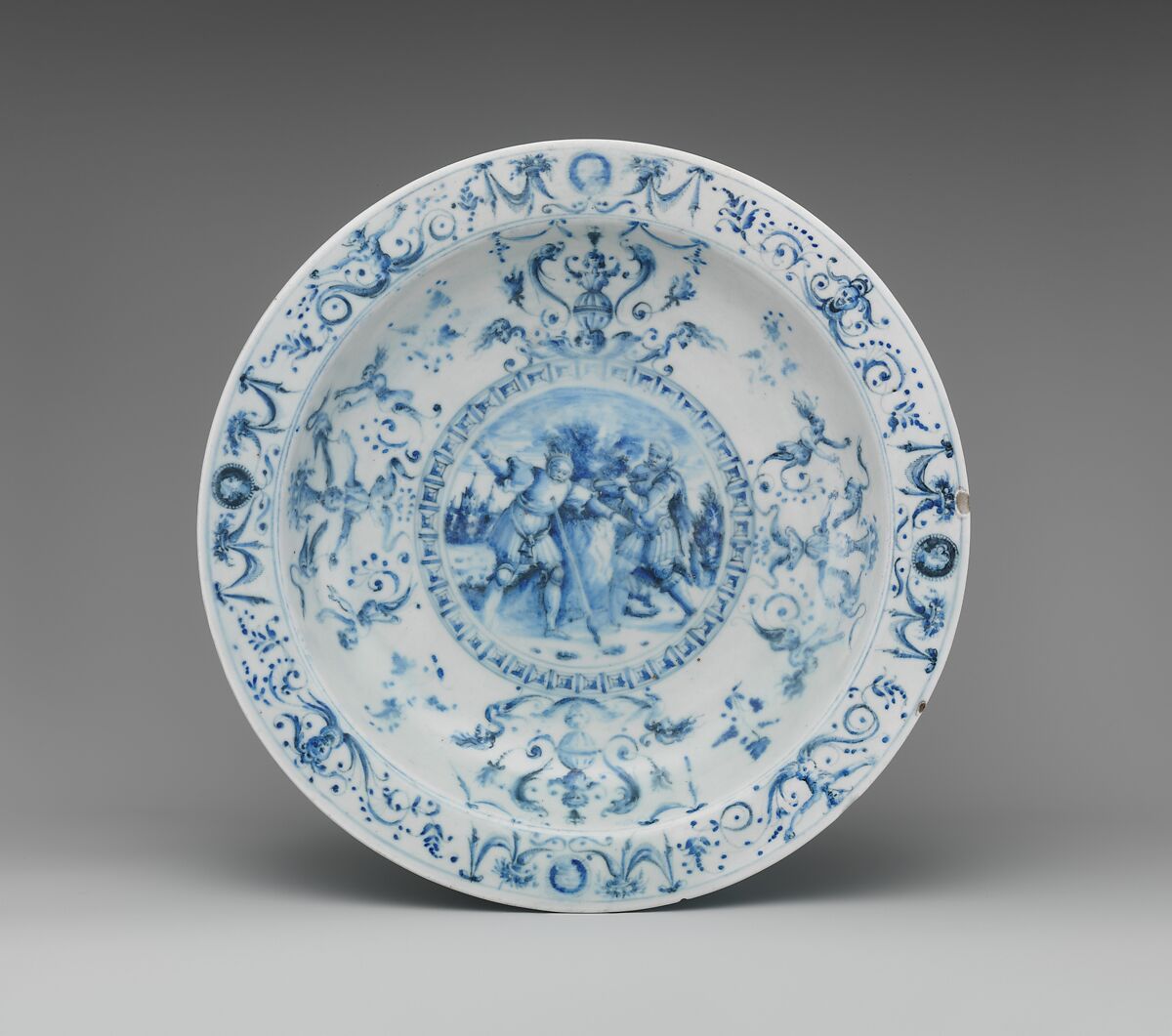 Dish depicting The Death of Saul, Medici Porcelain Manufactory (Italian, Florence, ca. 1575–ca. 1587), Soft-paste porcelain decorated in underglaze blue, Italian, Florence 