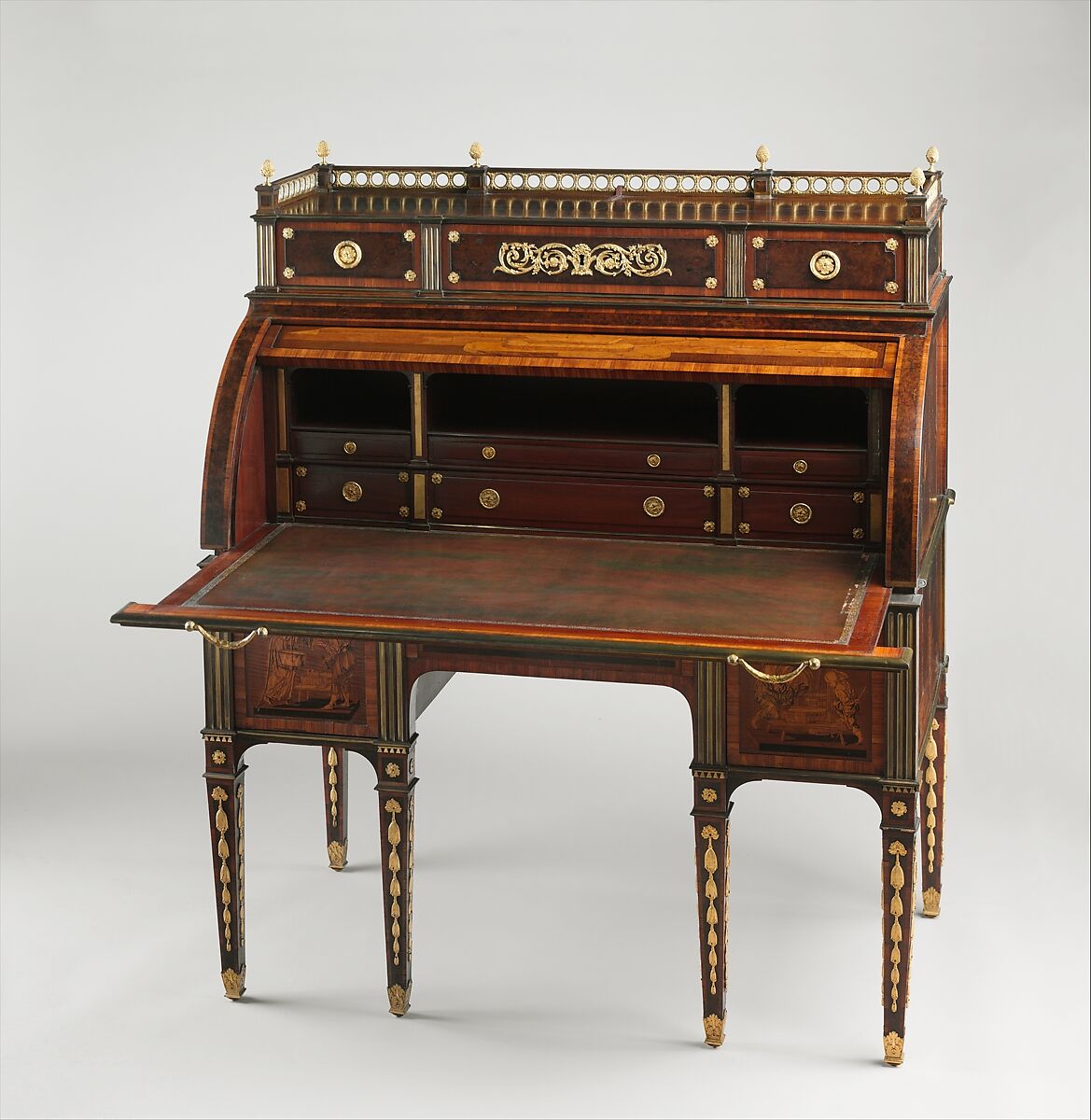 Rolltop desk, David Roentgen (German, Herrnhaag 1743–1807 Wiesbaden, master 1780), Oak, cherry, pine, mahogany, veneered with maple, burl woods, holly, hornbeam (all partially stained), tulipwood, mahogany, and other woods; mother-of-pearl; partially gilded and tooled leather; gilt bronze, iron, steel, brass, partially gold-lacquered brass, German, Neuwied am Rhein