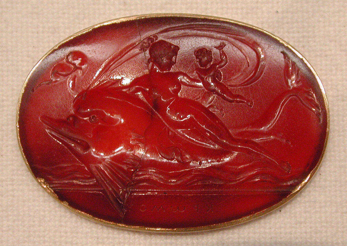 Ino with her infant Melicerta on the back of a dolphin, Carnelian and gold, Italian 