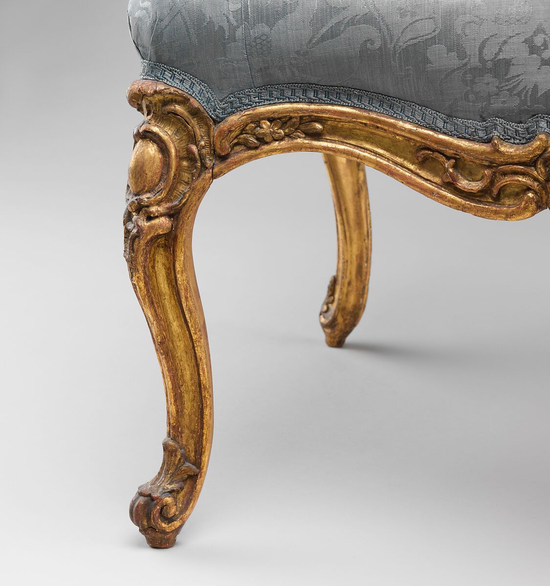 Armchair (fauteuil à la reine), Carved and gilded beech; covered in eighteenth-century blue damask not original to the armchair, Southwestern German