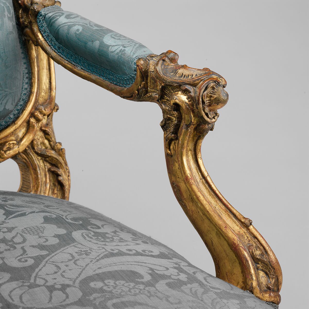 Armchair (fauteuil à la reine), Carved and gilded beech; covered in eighteenth-century blue damask not original to the armchair, Southwestern German