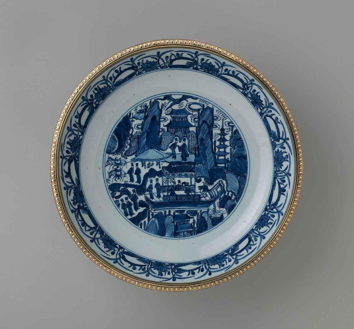 Mounted dish with figures in a landscape from Burghley House, Lincolnshire, Hard-paste porcelain, gilded silver, British, London mounts and Chinese porcelain