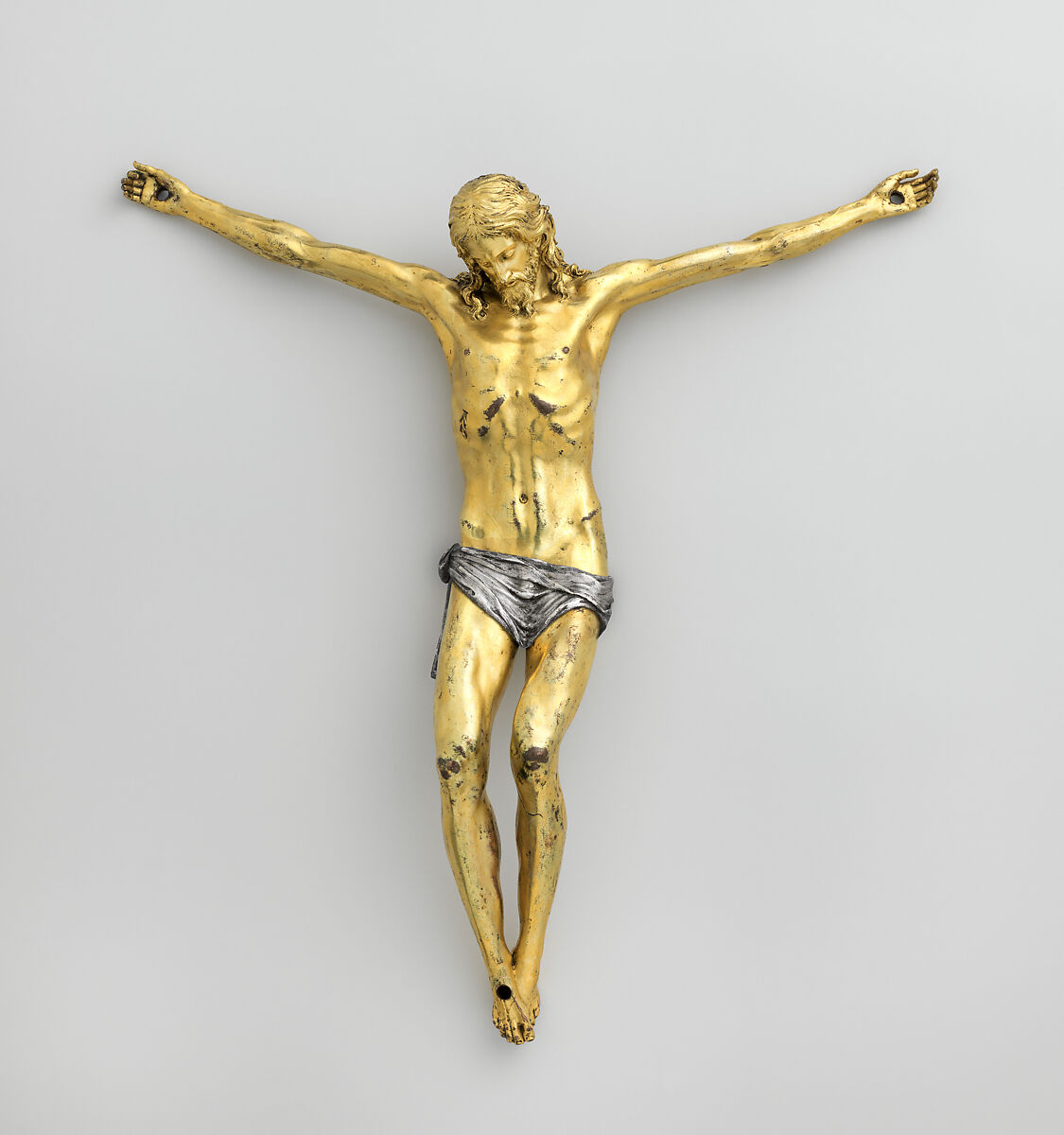 Corpus from a crucifix, Bronze, fire-gilt; silver, Possibly Italian or French 