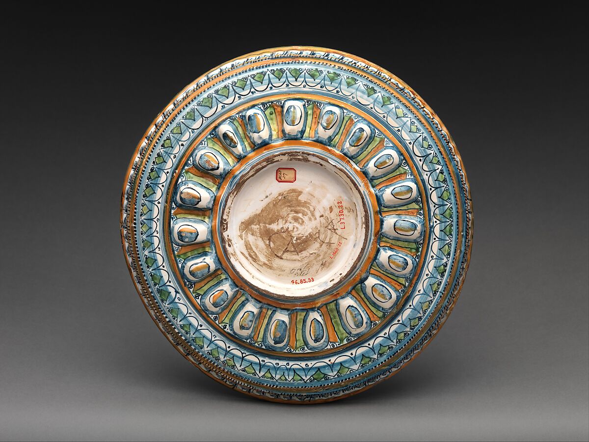 Basin with classicizing head, Maiolica (tin-glazed earthenware), Italian, Montelupo