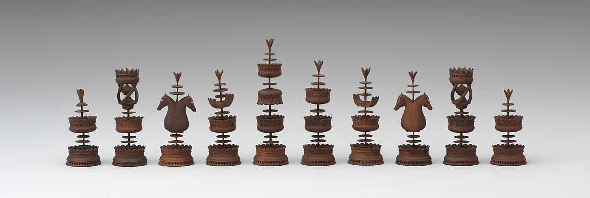 Chessmen (32) and box, Olive wood; leather, glass, German