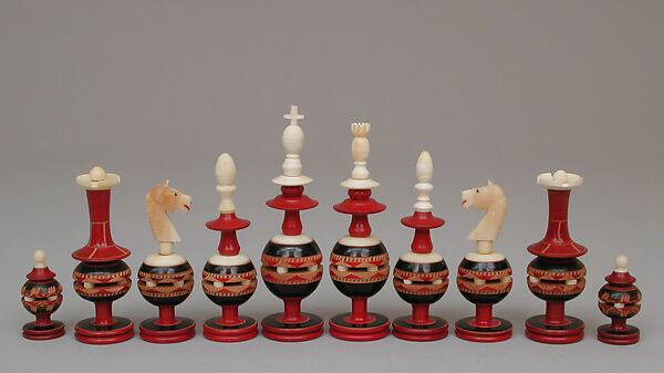 Chessmen (32) and box-board