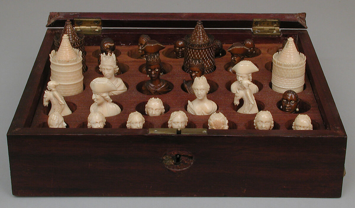 Frenchmen and African chessmen (32) and box, Ivory, mahogany, brass, French, Dieppe