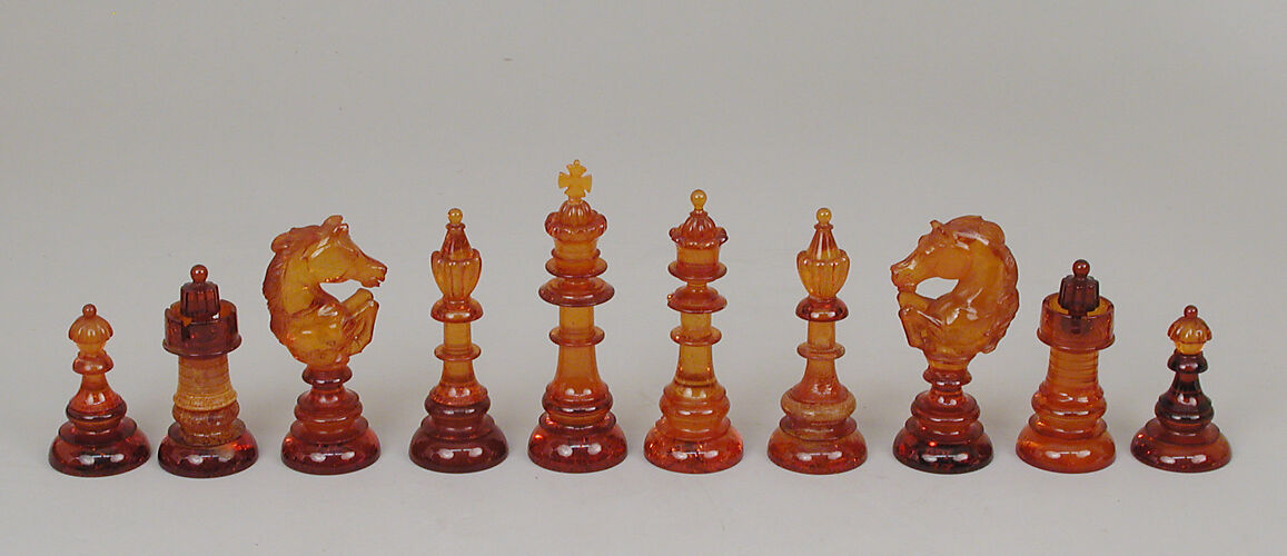 Chessmen (32) and box-board