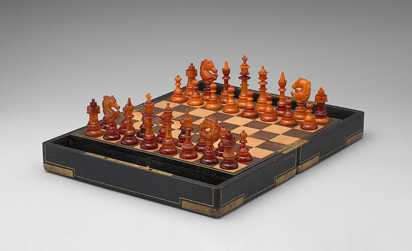 Chessmen (32) and box-board