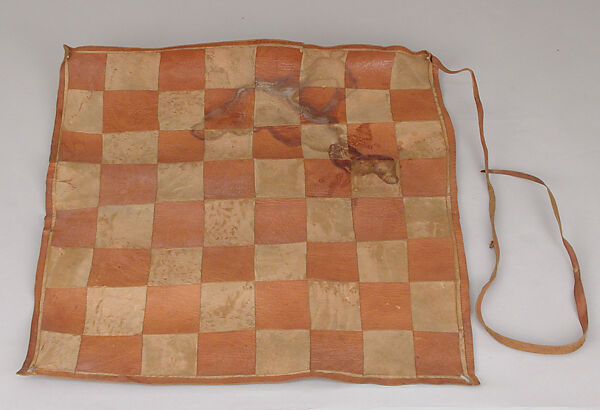 Chess set, Limba wood, goatskin, cotton, Nigerian