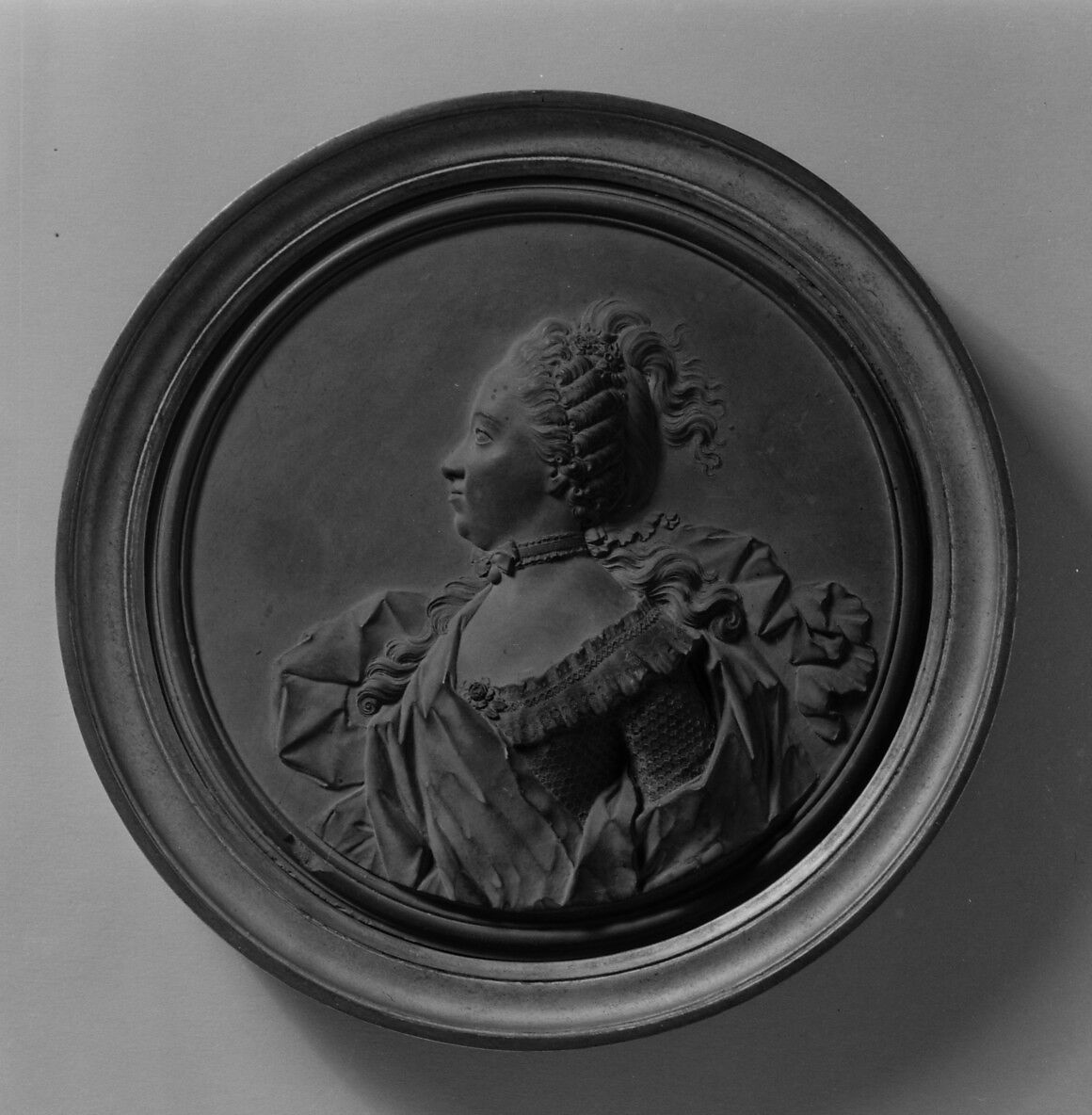 Portrait of a lady, possibly the Marquise de Vaudreuil, Jean-Baptiste Nini (Italian, Urbino 1717–1786 Chaumont-sur-Loire), Medallion: cast terracotta (terre de Chaumont); frame: gilt wood, French, Chaumont-sur-Loire 