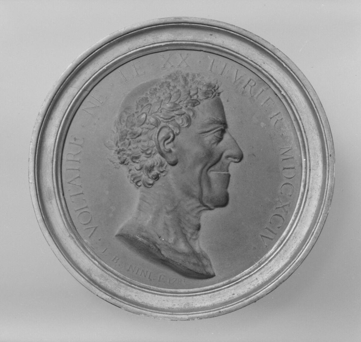 Voltaire (François-Marie Arouet, 1694–1778), Jean-Baptiste Nini (Italian, Urbino 1717–1786 Chaumont-sur-Loire), Medallion: cast terracotta (terre de Chaumont); frame: gilt wood, French, Chaumont-sur-Loire 