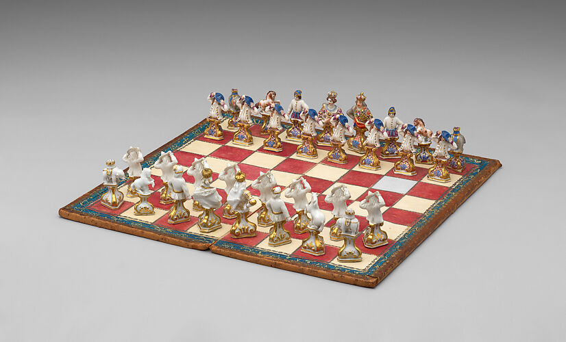 Chessmen (32) and board with case