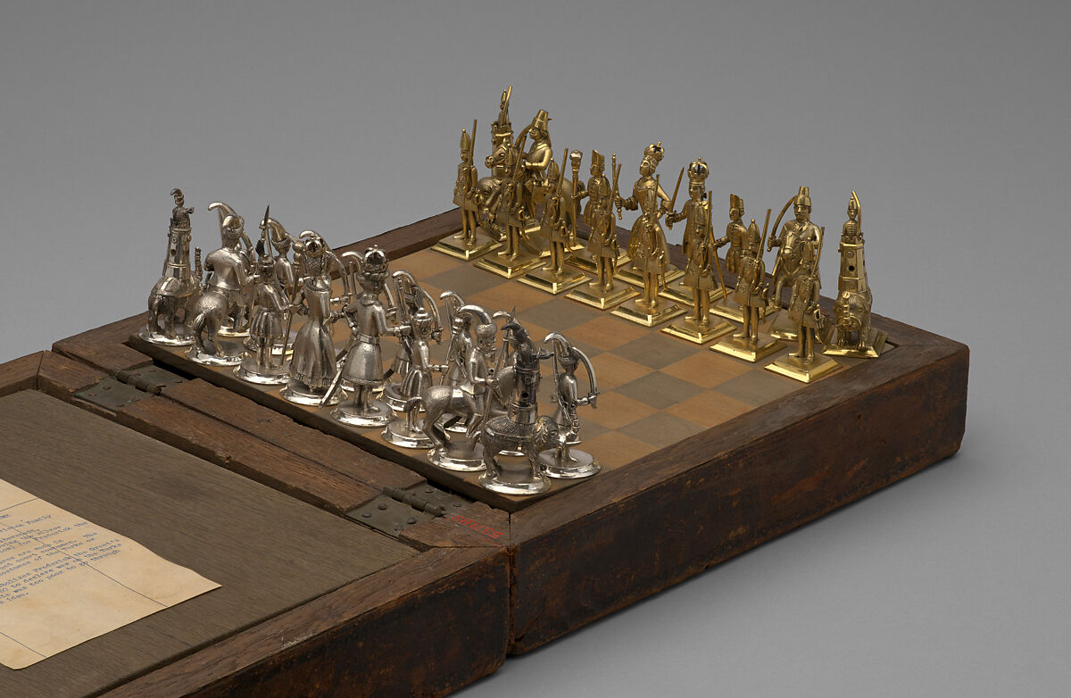 Chess set and box-board, Base metal, silvered, and silver-gilt, Indian or Turkish chessmen with probably German bases