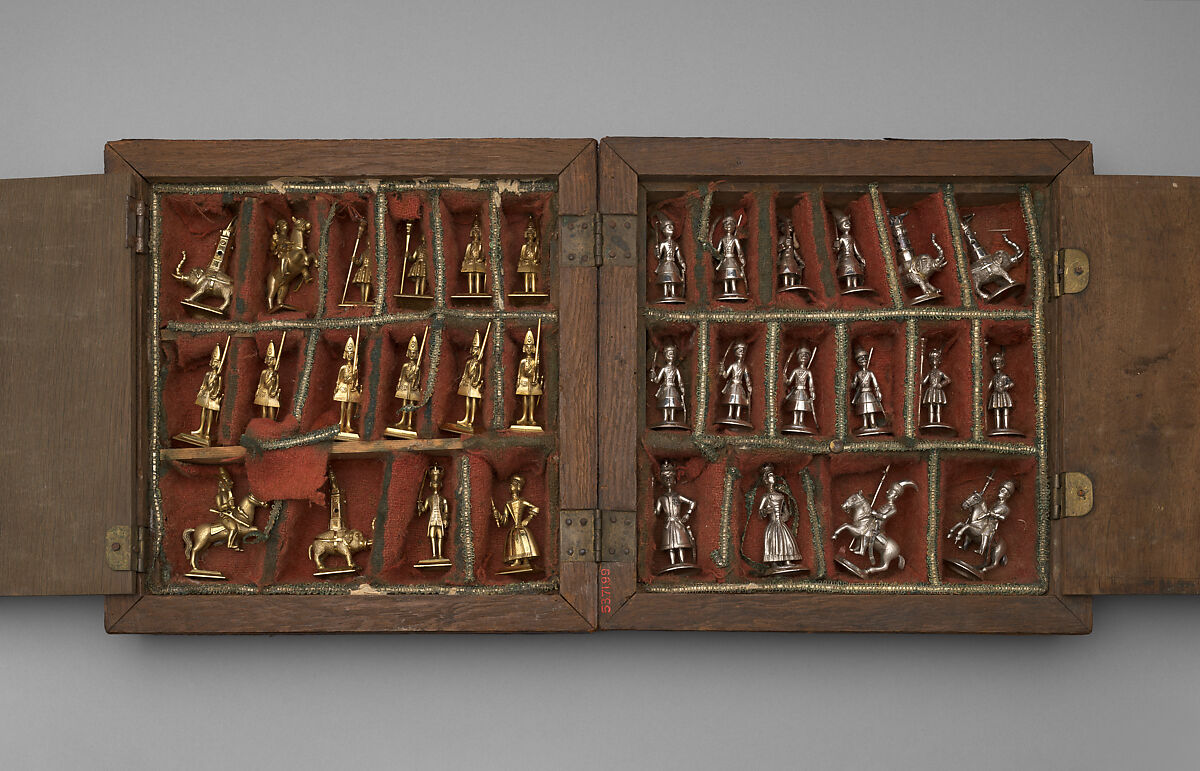 Chess set and box-board, Base metal, silvered, and silver-gilt, Indian or Turkish chessmen with probably German bases