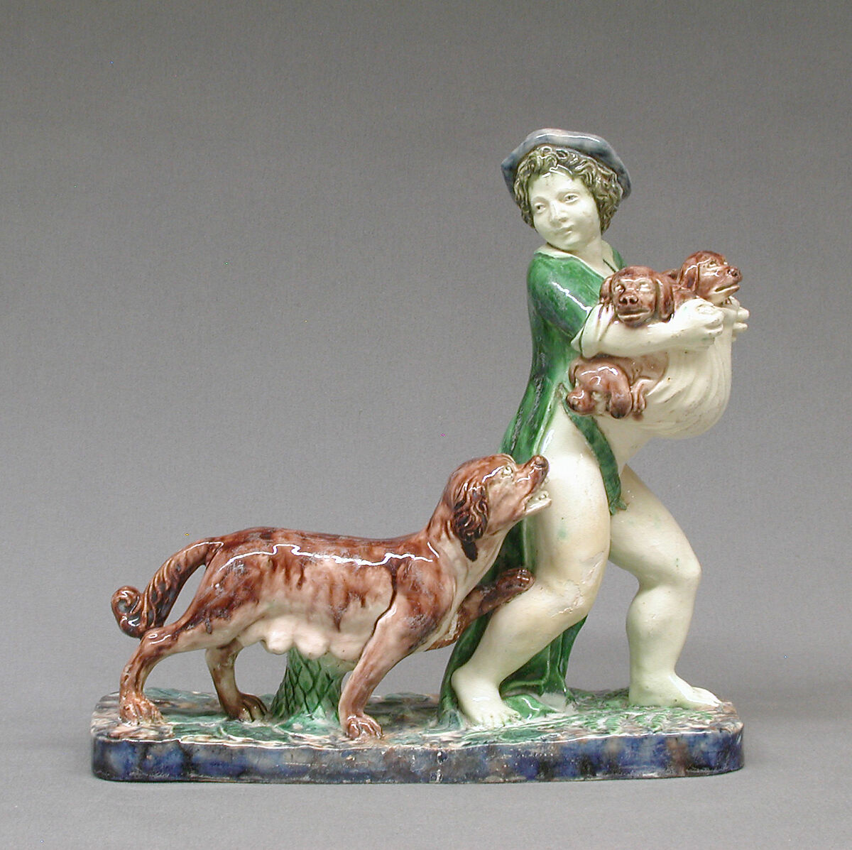 Boy carrying pups, Lead-glazed earthenware, French, Fontainebleau 