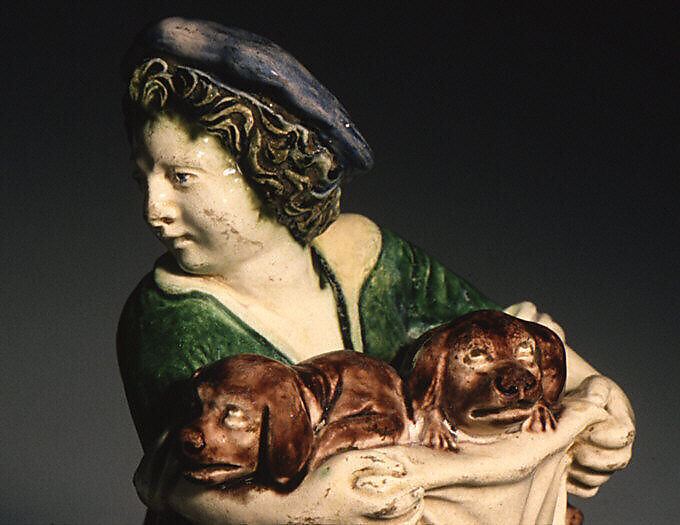 Boy carrying pups, Lead-glazed earthenware, French, Fontainebleau