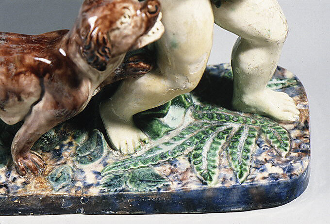 Boy carrying pups, Lead-glazed earthenware, French, Fontainebleau