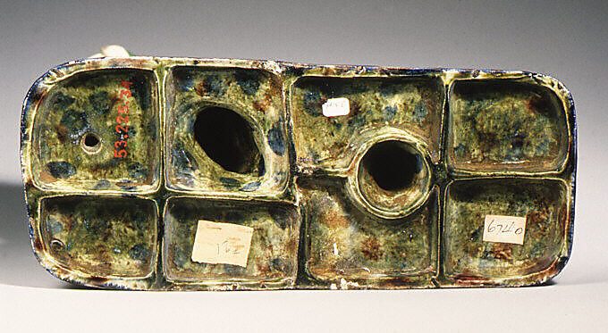 Boy carrying pups, Lead-glazed earthenware, French, Fontainebleau