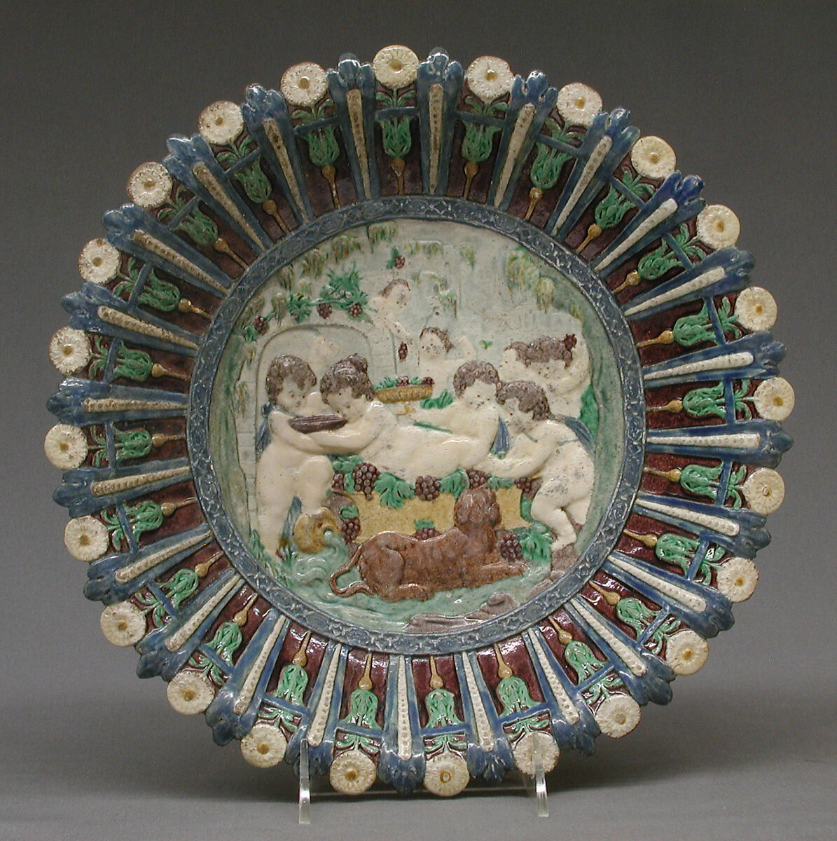 Dish with childhood of Bacchus, Manner of Bernard Palissy (French, Agen, Lot-et-Garonne 1510–1590 Paris), Lead-glazed earthenware, French 