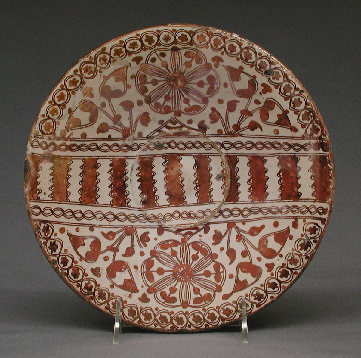 Plate, Tin-glazed and luster-painted earthenware, Spanish, Muel, Aragon 