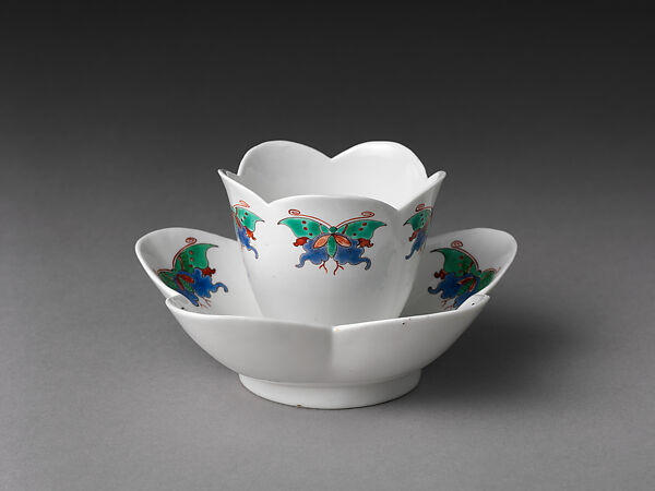 Cup and saucer with butterflies